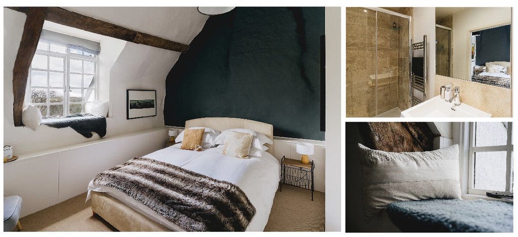 Luxurious rustic bedroom at Weeke Barton with plush bedding, wooden beams, and soft natural light, showcasing a serene countryside retreat in the United Kingdom