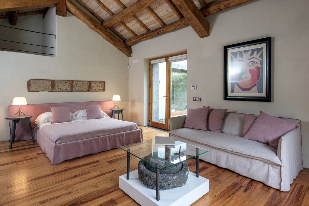 Luxurious four-bedroom villa at Monaci delle Terre Nere, featuring elegant interiors, sweeping vineyard views, and a pristine private pool in Sicily, Italy.