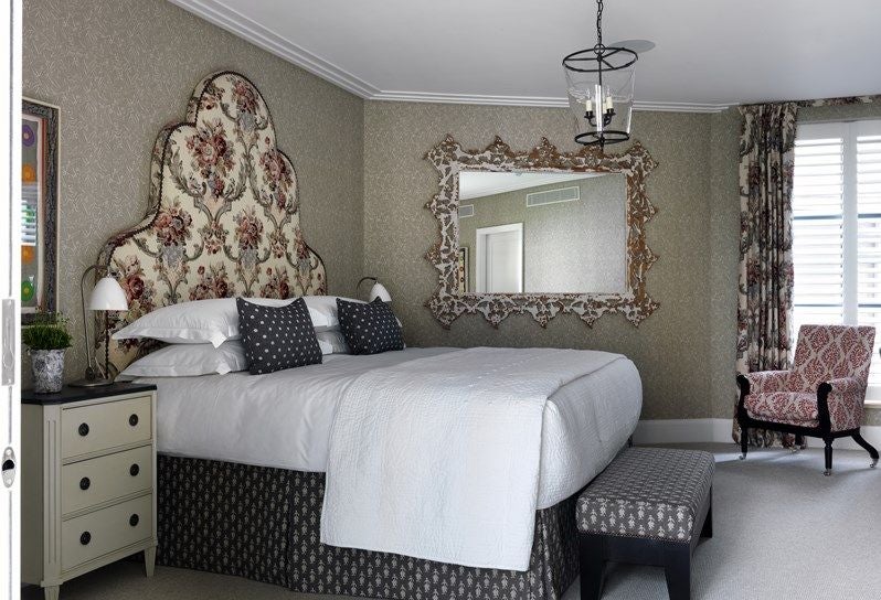 Luxurious two-bedroom hotel suite at Ham Yard Hotel, featuring contemporary design, plush furnishings, and sophisticated urban elegance in the United Kingdom.