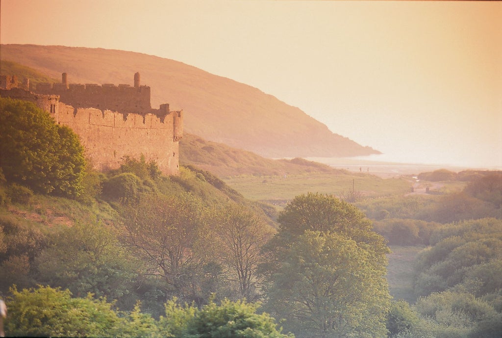 Luxurious countryside hotel nestled in lush Welsh landscape, featuring elegant stone exterior, manicured gardens, and traditional architectural charm of Narberth region