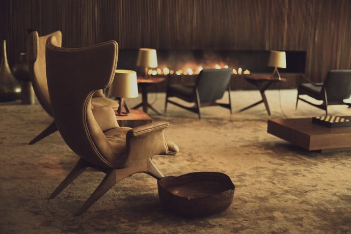 The warmth of the fireplace in the lobby