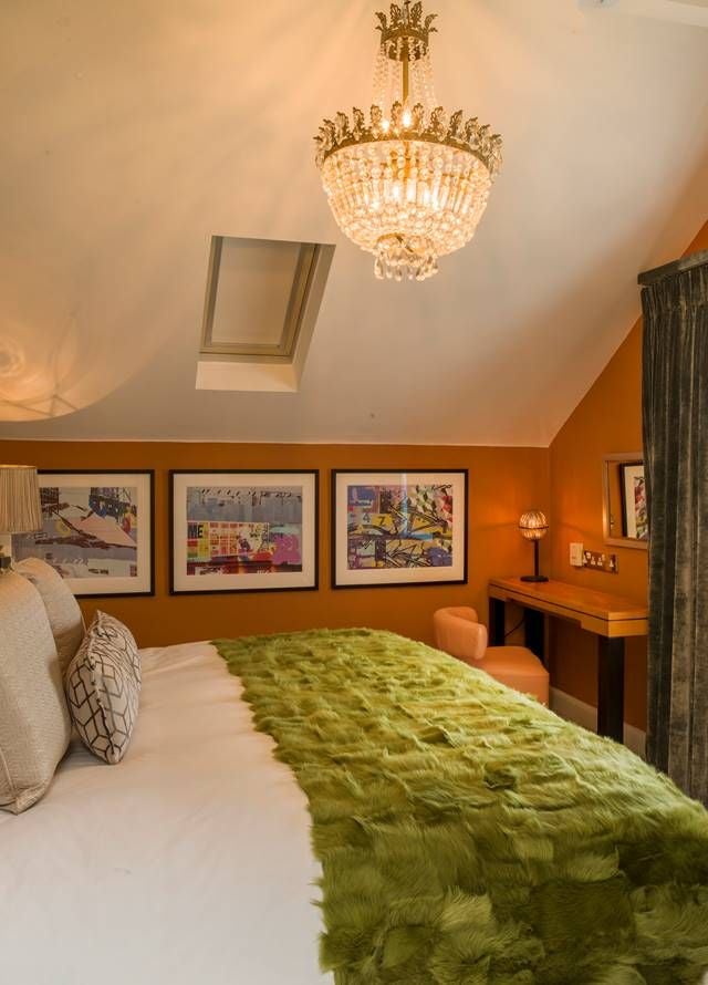 Luxurious junior suite at Homewood Hotel & Spa with plush king bed, elegant neutral decor, modern furnishings, and soft ambient lighting in a spacious UK hotel room