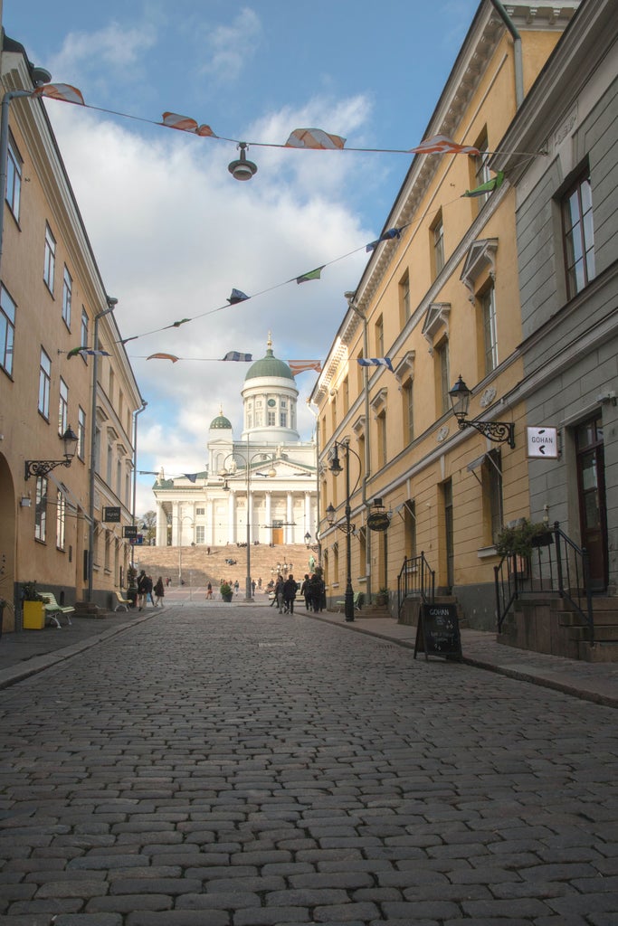 Luxurious Helsinki city tour capturing historic architecture, elegant streets, and modern Finnish design with scenic waterfront and classic Nordic aesthetics