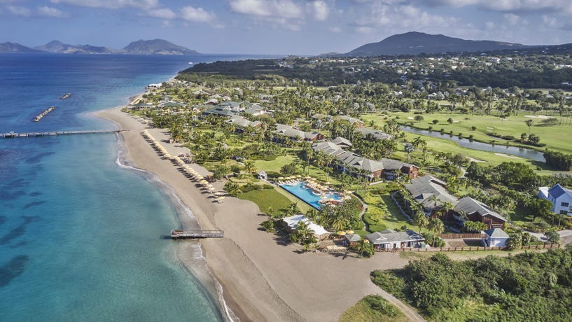 Enjoy the nearly three miles of pristine beach at a resort in Nevis.
