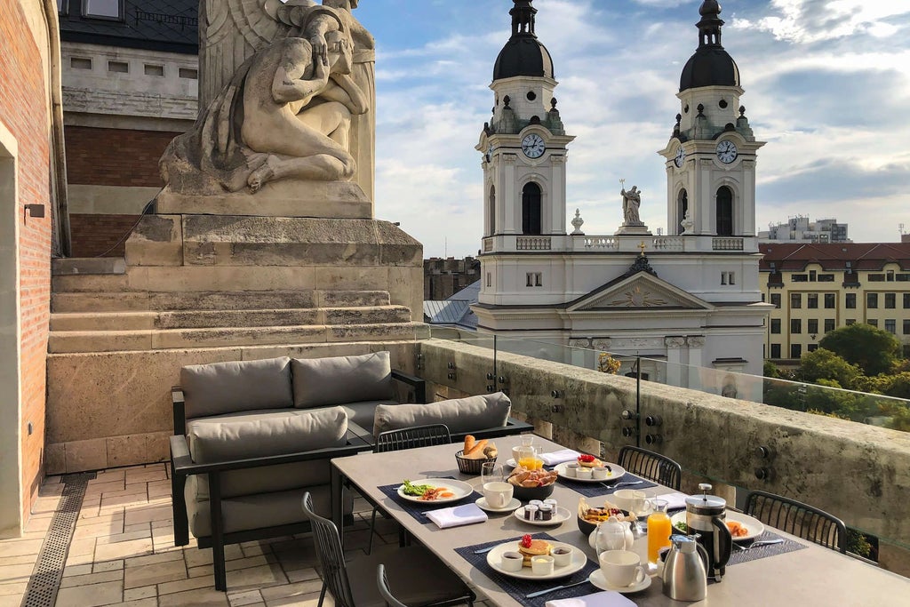 Spacious luxurious presidential suite with panoramic terrace, elegant modern decor, plush furnishings, and expansive views of Hungarian cityscape