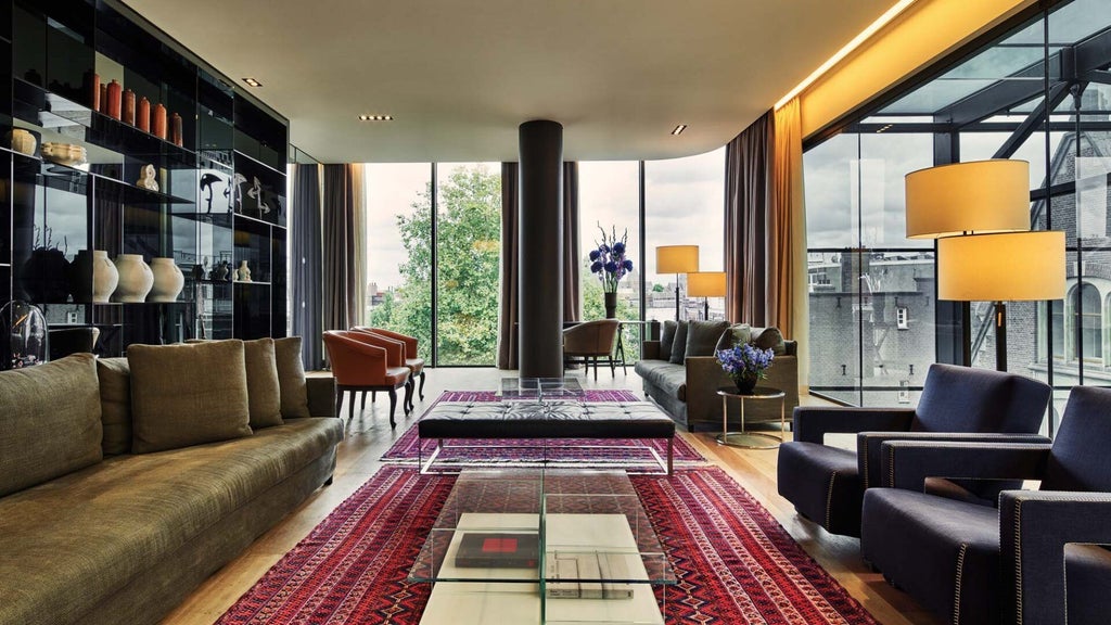 Luxurious Amsterdam penthouse suite with contemporary design, floor-to-ceiling windows overlooking historic cityscape, modern furnishings and elegant decor