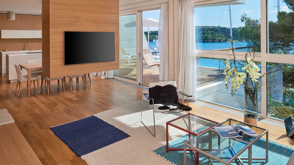 Luxurious contemporary villa with panoramic Adriatic Sea view, sleek minimalist design, floor-to-ceiling windows, and private terrace overlooking Croatian coastline