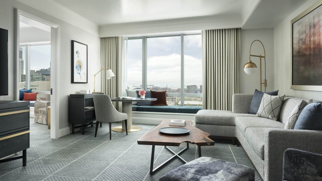 Luxurious Four Seasons executive suite with panoramic city views, featuring elegant contemporary design, plush king bed, and sophisticated neutral color palette