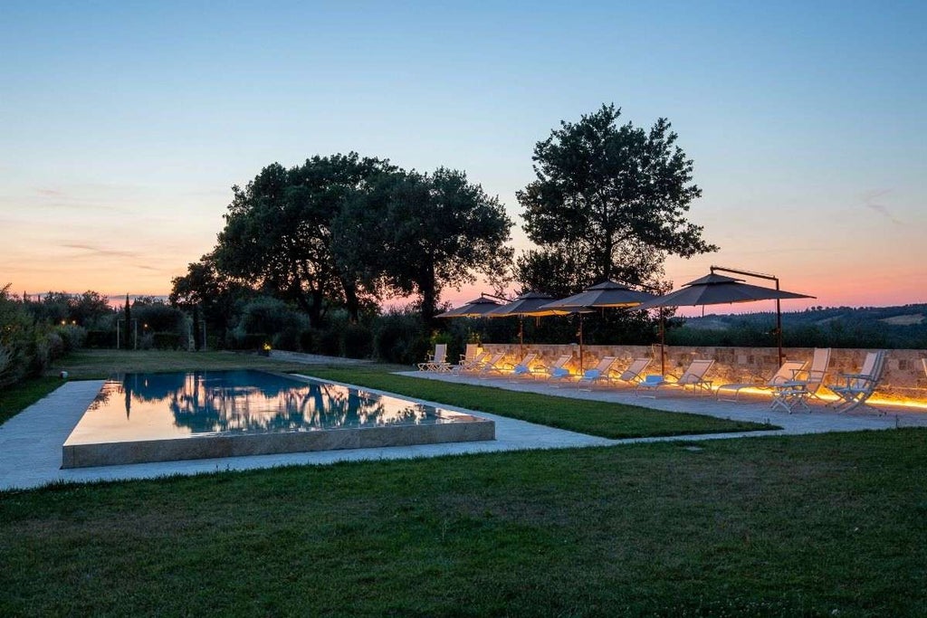 Elegant Italian villa with stone facade, arched windows, and manicured garden featuring ornate fountains and Mediterranean flora