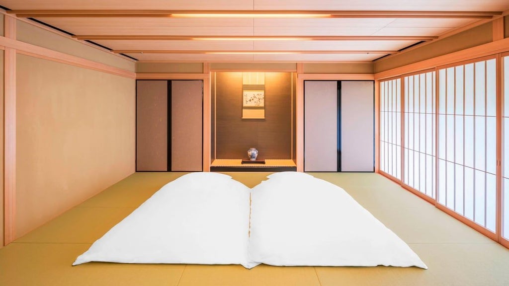 Elegant Japanese-inspired presidential suite with traditional wooden accents, modern furnishings, and panoramic view of Kyoto's lush landscape through floor-to-ceiling windows