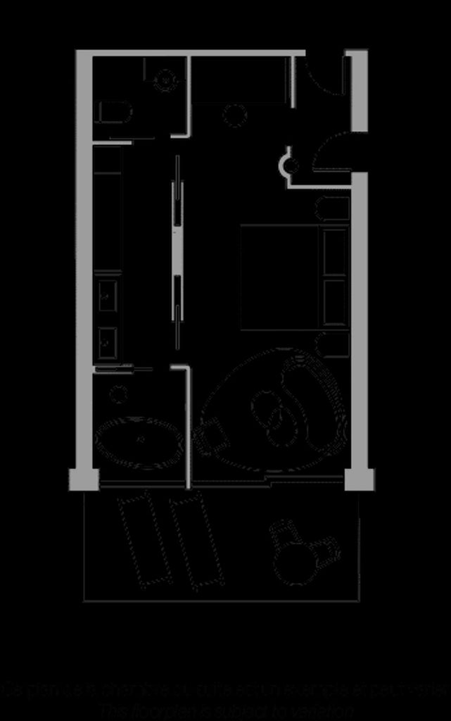 Modern luxury studio with floor-to-ceiling windows offering panoramic Mediterranean views, white bedding, and sleek minimalist furniture