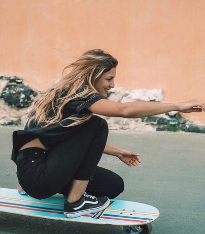 Practising surf moves on a noserider board