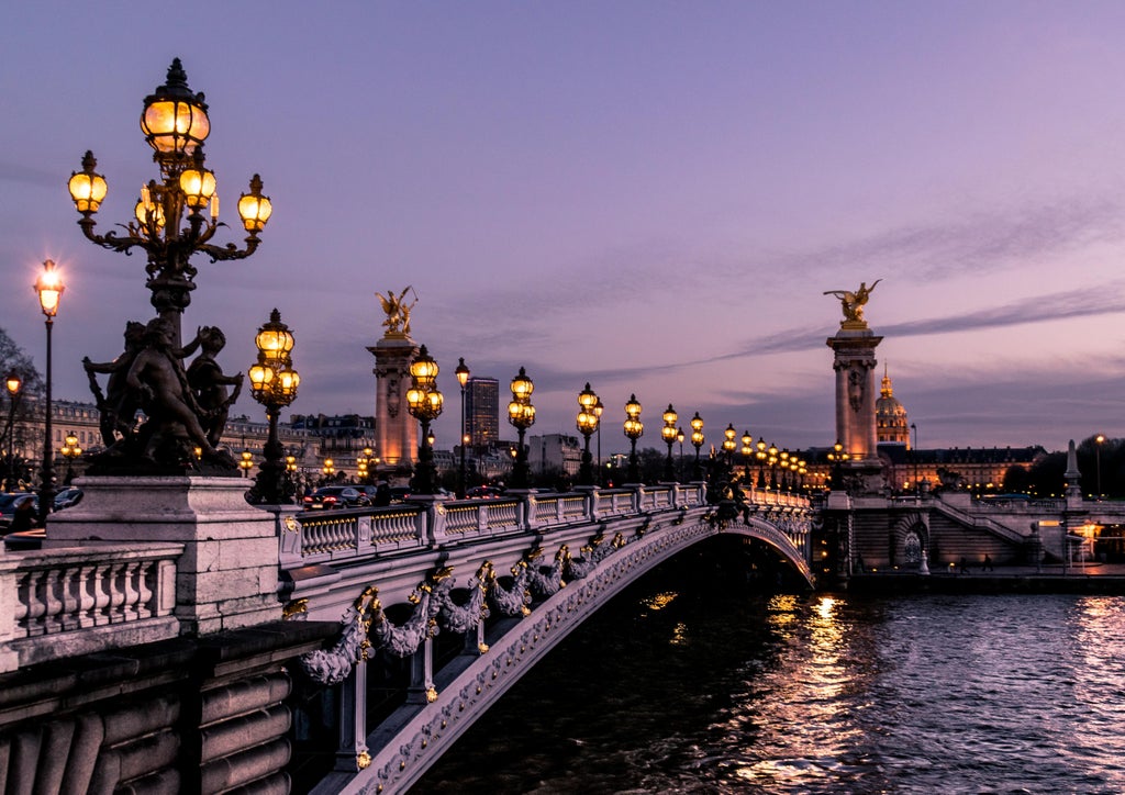 Seine river cruise with elegant boat, Eiffel Tower silhouette, golden sunset reflecting on water, luxurious Parisian cityscape with historic architecture