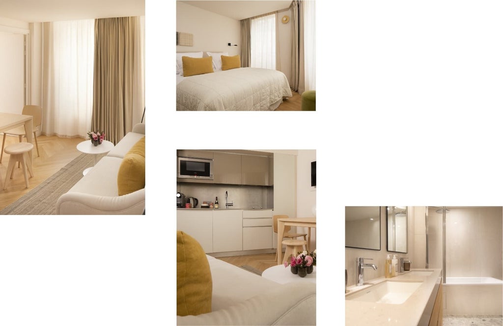 Elegant Parisian deluxe hotel room with plush white bedding, soft neutral tones, contemporary furnishings, and large windows offering soft natural light