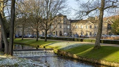 Luxurious Grantley Hall hotel nestled in lush Yorkshire countryside, featuring elegant stone facade, manicured gardens, and grand architectural design