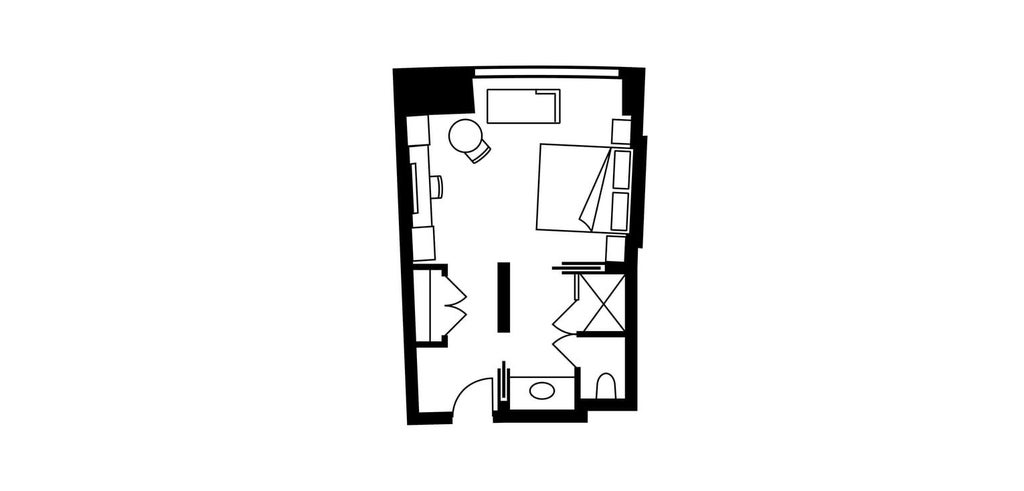 Spacious deluxe accessible hotel room with modern decor, king bed, hardwood floors, and expansive city view at Four Seasons Hotel in downtown scenset