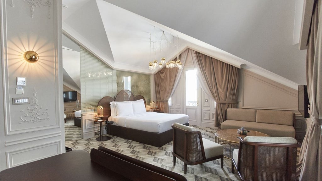 Luxurious Ottoman-style family mansion suite overlooking Bosphorus, featuring ornate antique furniture, rich textiles, and elegant traditional Turkish decor