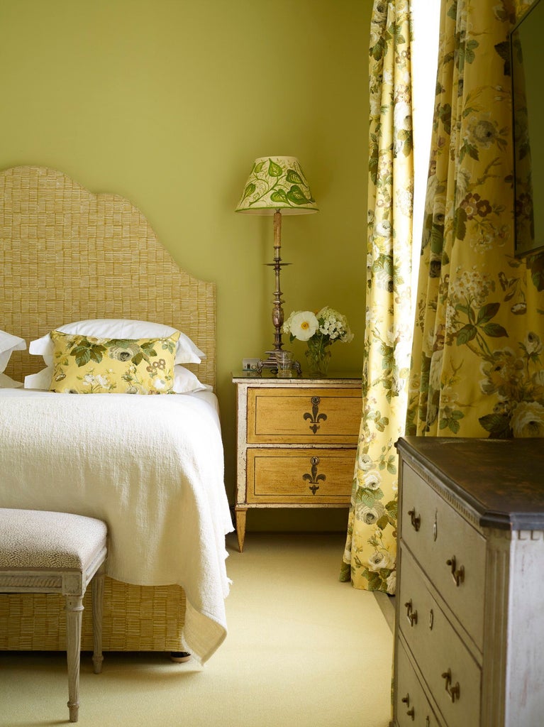 Elegant thyme-accented luxe bedroom with plush white bedding, crisp linens, soft neutral tones, and refined minimalist design in a modern UK hotel suite