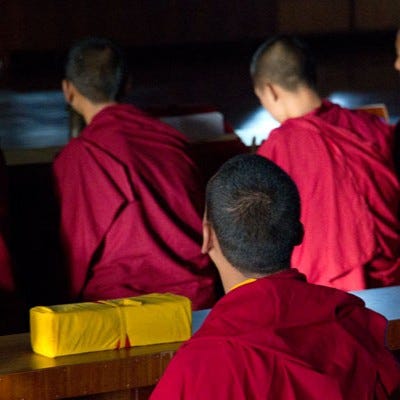 Monks in session at Neydo Monastery