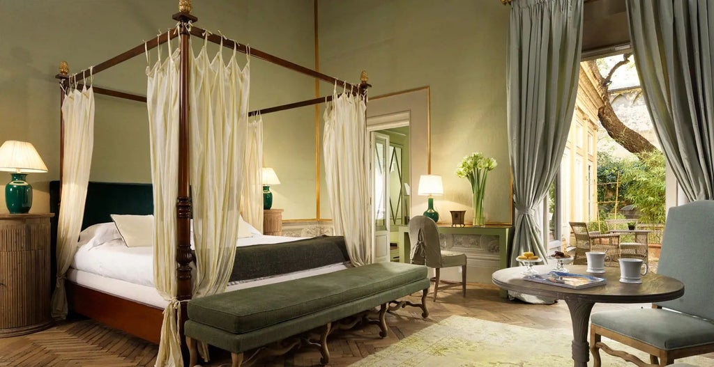 Elegant Tuscan suite with ornate chandelier, antique furnishings, and frescoed walls in a historic palazzo near Florence, showcasing refined Italian luxury