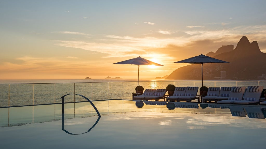 High-end luxury Hotel Fasano building in Rio de Janeiro with sleek glass façade, oceanfront location, and modern geometric architecture