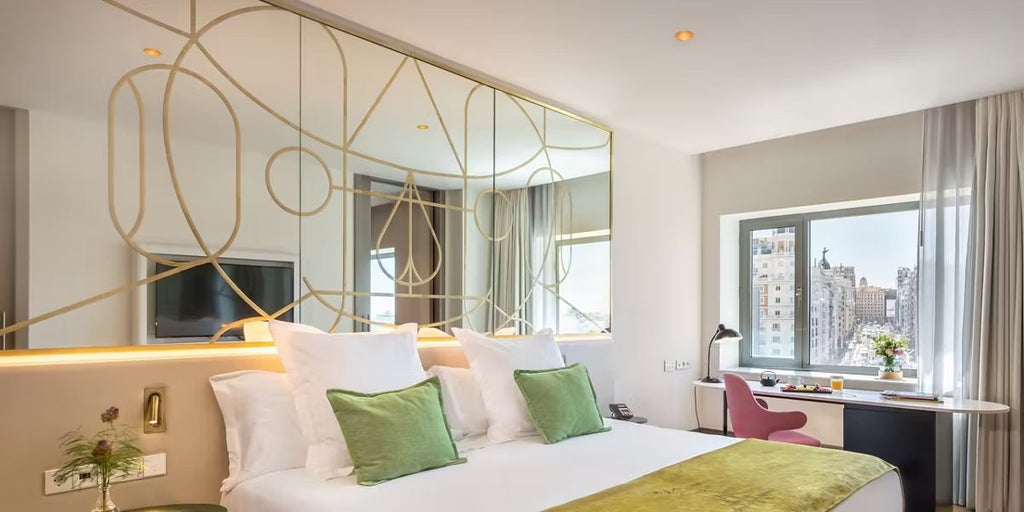 Luxurious Madrid hotel suite with expansive city skyline, modern contemporary design, floor-to-ceiling windows showcasing urban panorama and elegant interior styling