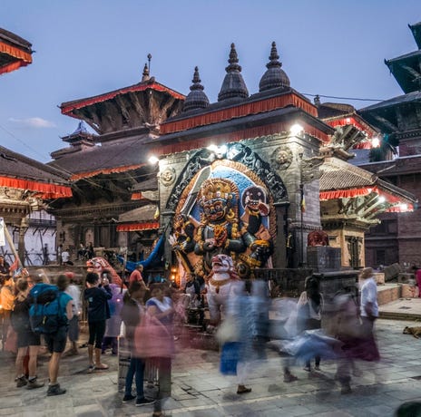 Evening visitors to the Hindu shrine of Kaal Bhairav