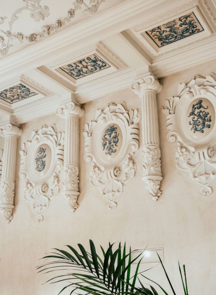 Luxurious white and beige interior of URSO Hotel & Spa in Madrid, featuring elegant marble floors, minimalist decor, and soft natural lighting