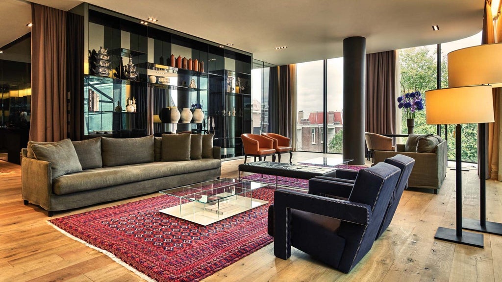 Luxurious penthouse suite with modern Dutch design, expansive city views, sleek furnishings, and floor-to-ceiling windows overlooking Amsterdam's skyline