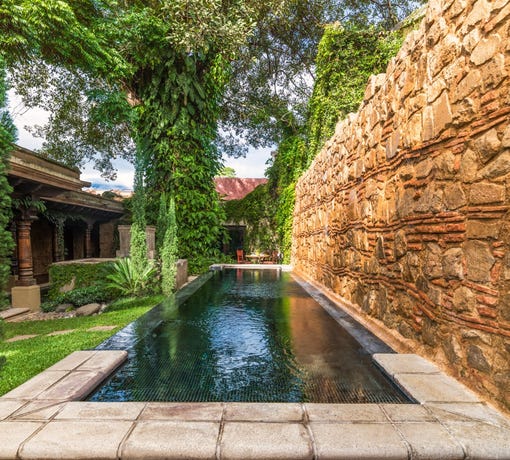 A plunge pool in a quiet courtyard