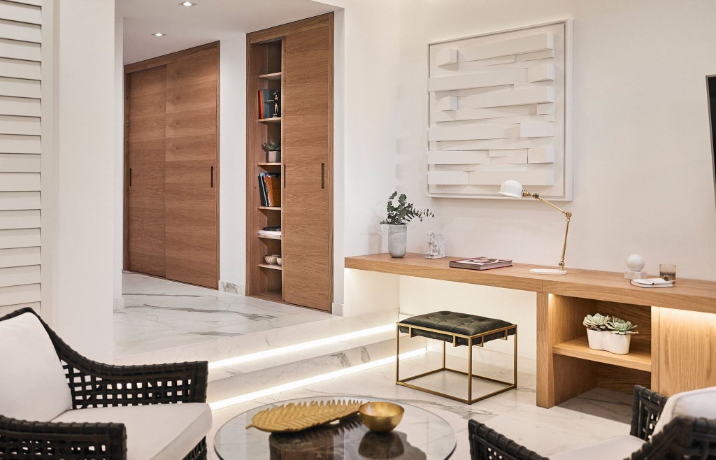 Luxurious Nobu Hotel Marbella studio suite with modern design, white furnishings, elegant bed, and sleek minimalist Spanish coastal interior styling