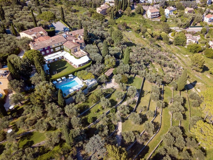 Wander in immaculately manicured garden