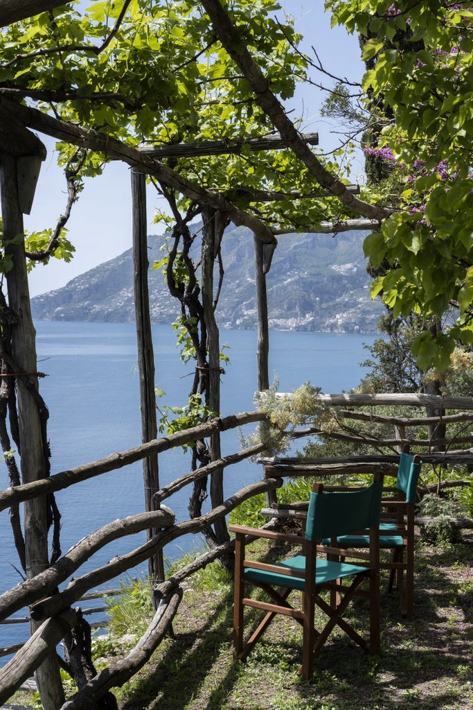 Cliffside medieval watchtower villa with multiple annexes, lemon gardens and private sea access, featuring antique and modern