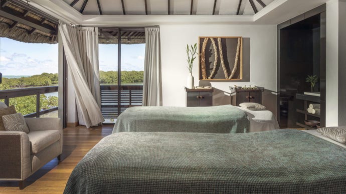 Rejuvenate in one of eight overwater couple's treatment suites
