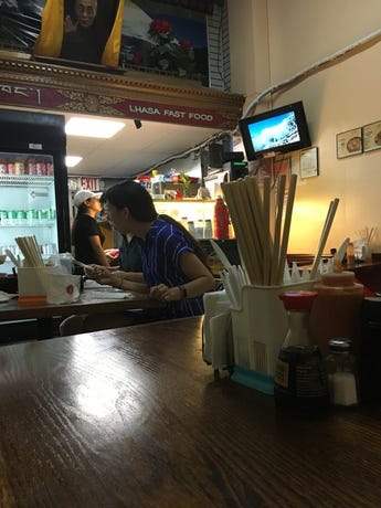 Get your savory Tibetan dumplings, momo, in a literal hole-in-the-wall, located in the back of a Jackson Heights shop