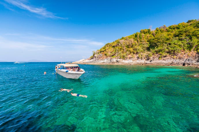 Charter a boat and explore neighboring islands
