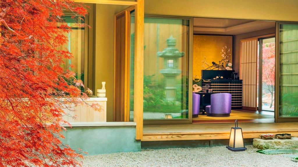 Elegant traditional Japanese ryokan-style luxury hotel with wooden architecture, nestled by serene Kyoto river with lush garden and refined architectural details