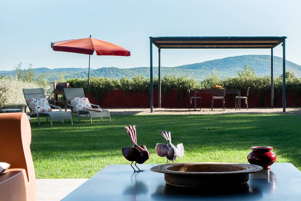 Rustic luxe Tuscan countryside boutique hotel with stone walls, terracotta roofs, cypress trees, and lush green landscape near scenic Italian vineyards