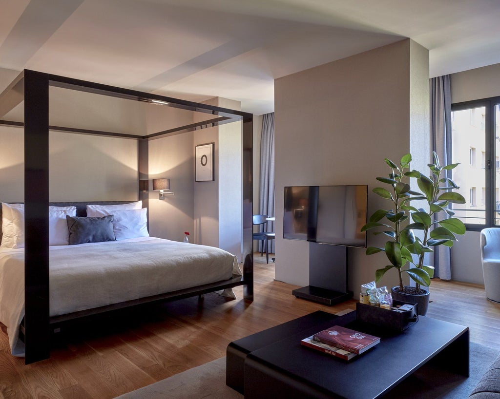 Modern luxury suite with floor-to-ceiling windows, minimalist design, natural wood tones, panoramic city view, sleek contemporary furniture, and elegant neutral color palette