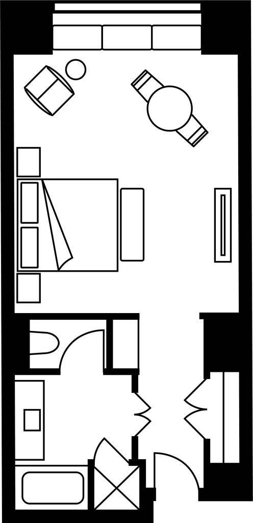 Luxurious Four Seasons hotel premier cityscape room with floor-to-ceiling windows, modern furnishings, and stunning Miami skyline view at sunset