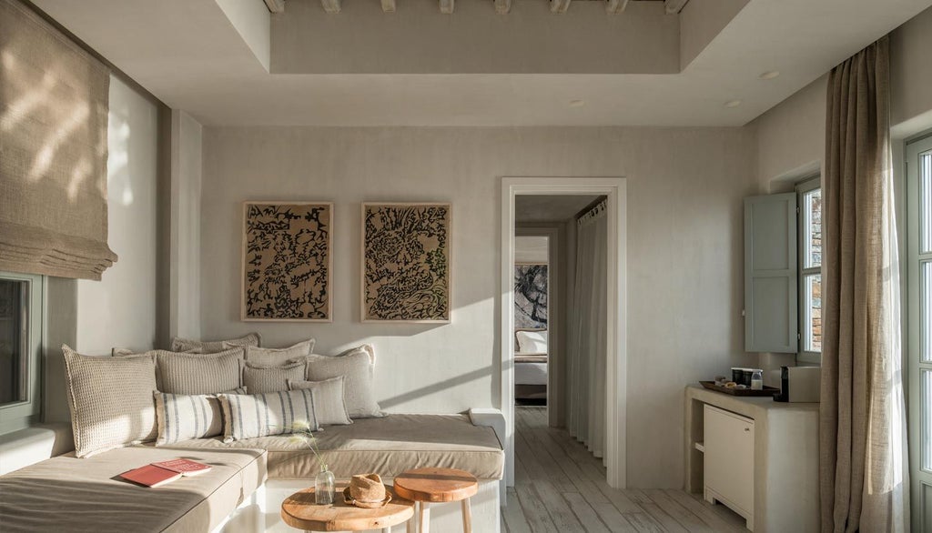 Luxurious white minimalist hotel room with sweeping Aegean Sea view, clean lines, crisp linens, and elegant Greek island design in soft neutral tones