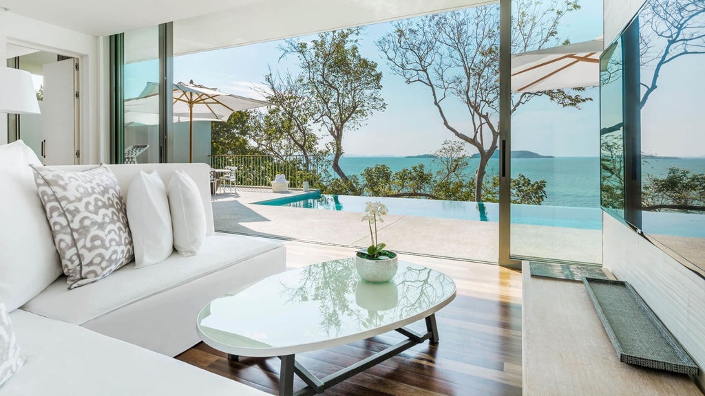 Luxurious two-bedroom pool villa with panoramic Andaman Sea views, sleek modern design, private infinity pool, and minimalist Thai-inspired interior decor