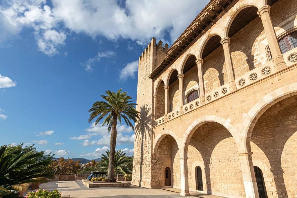 Luxurious stone facade of historic Convent de la Missió hotel in Palma, featuring elegant architecture and traditional Mediterranean design elements