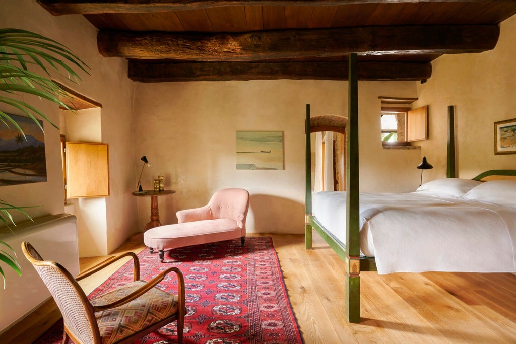 Luxurious Italian suite with rustic stone walls, elegant white linens, wooden floors, and panoramic views of Tuscan countryside through arched windows