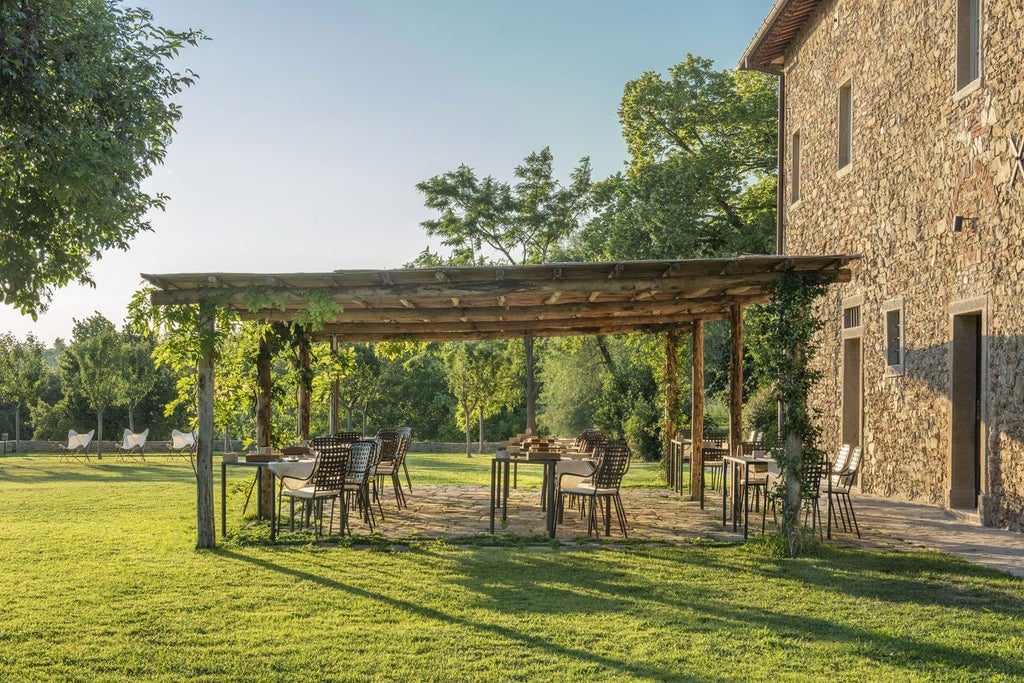 Elegant stone villa nestled in Tuscan countryside, with rolling green hills, cypress trees, and golden afternoon sunlight illuminating rustic architecture