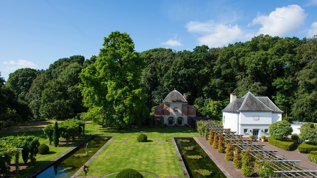 Luxury countryside hotel with modern forest-green wooden exterior, nestled in lush New Forest landscape, elegant architectural design blending rustic charm and contemporary style