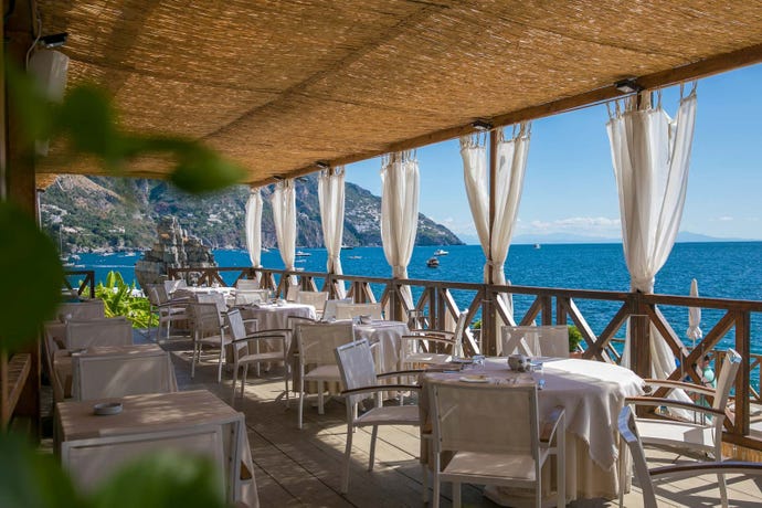 Enjoy meals at the hotel with stunning views of the Amalfi Coast
