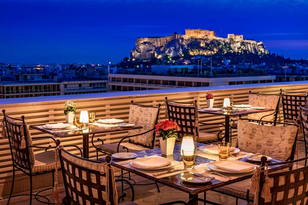 Elegant five-star hotel in Athens with classic Greek architecture, white marble columns, and majestic balconies overlooking Syntagma Square