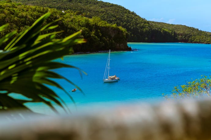 The captivating turquoise waters surrounding the jungle landscape of St. Lucia