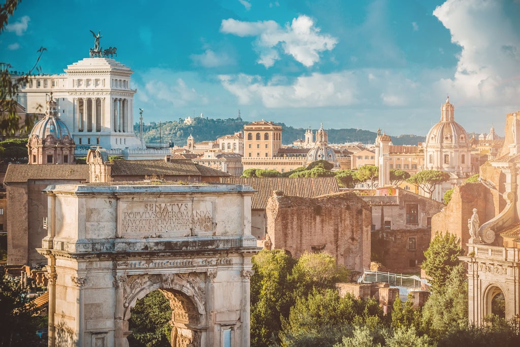 Beautiful illuminated Colosseum at dusk with golden sunset lighting, ancient stone arches and columns cast dramatic shadows